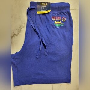 Polo by Ralph Lauren Blue Athletic Shorts with Drawstring and Graphic Design.